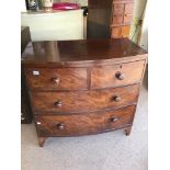 A TWO OVER TWO VICTORIAN MAHOGANY CHEST OF DRAWERS