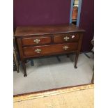 A THREE DRAWER GEORGIAN MAHOGANY CONSOLE TABLE