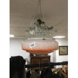 A 1950/60'S GLASS LIGHT SHADE WITH CHAINS