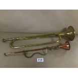 A BRASS AND COPPER HORN INSTRUMENT