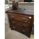 A LATE 19TH/EARLY 20TH CENTURY OAK CHEST OF THREE DRAWERS WITH CARVED LEAF HANDLES, 80CM WIDE