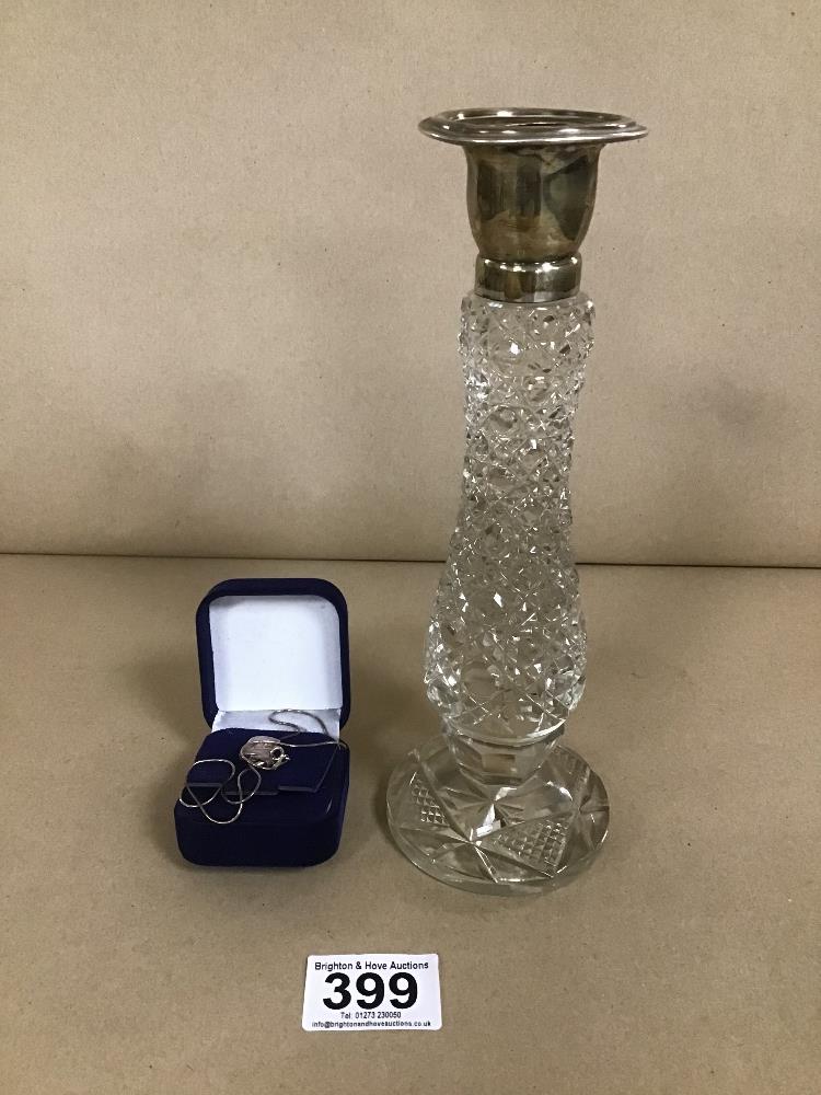 A HALLMARKED SILVER AND CRYSTAL GLASS CANDLESTICK WITH A SILVER CHAIN AND ENAMEL PENDANT ALSO SILVER