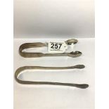 A PAIR OF VICTORIAN SILVER SUGAR TONGS, HALLMARKED LONDON 1868 BY HENRY HOLLAND, TOGETHER WITH A