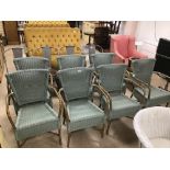 A SET OF SEVEN GREY PAINTED WICKER GARDEN CHAIRS METAL ARM RESTS AND LEGS