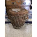 A HAND CARVED SKIN TOPPED DRUM 45CMS HIGH