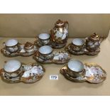 A FOURTEEN PIECE SATSUMA JAPANESE EGG SHELL PART TEA SERVICE