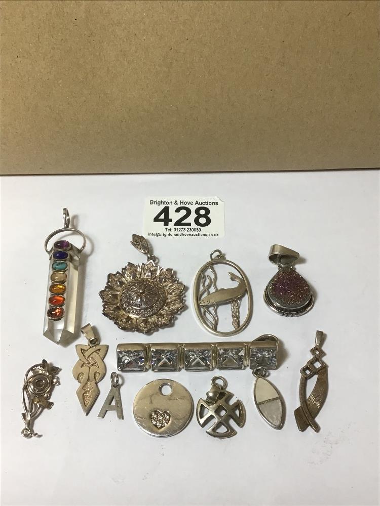 A MIXED LOT OF VINTAGE SILVER PENDANTS OF VARYING SHAPES AND DESIGNS, SOME GEM SET, INCLUDING A