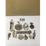 A MIXED LOT OF VINTAGE SILVER PENDANTS OF VARYING SHAPES AND DESIGNS, SOME GEM SET, INCLUDING A