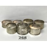 FIVE SILVER NAPKIN RINGS AND TWO SILVER PLATED EXAMPLES, SILVER WEIGHT 103G