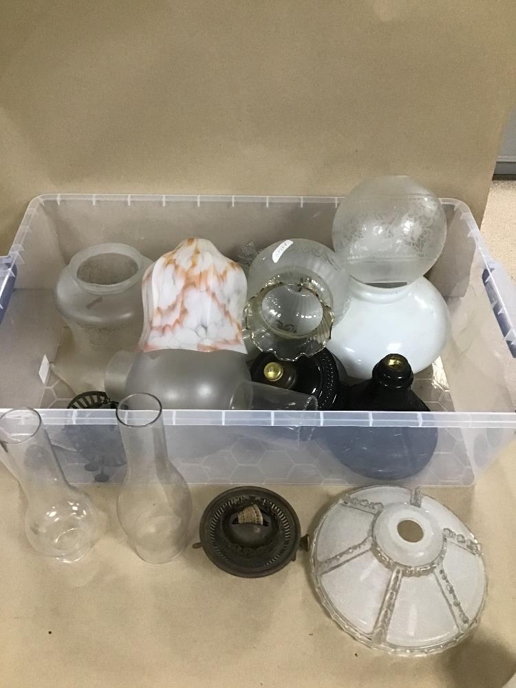 A COLLECTION OF MAINLY GLASS LAMP SHADES AND PARTS FOR OIL LAMPS