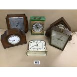 FIVE VINTAGE CLOCKS AND A BAROMETER INCLUDED SOME ARE OAK CASED MANTLE CLOCKS