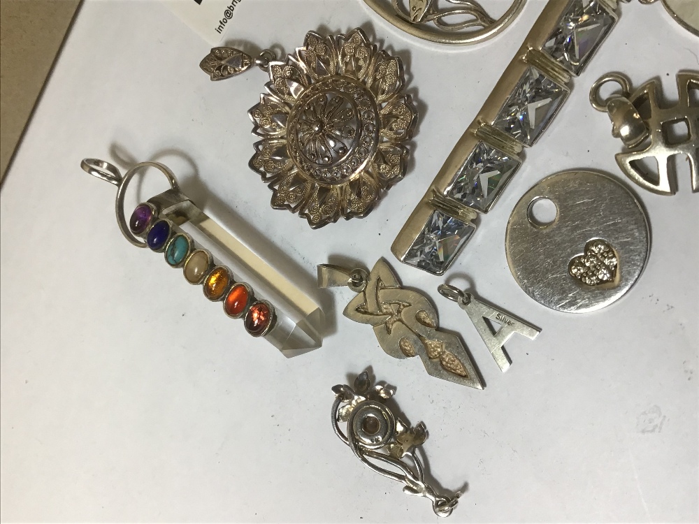 A MIXED LOT OF VINTAGE SILVER PENDANTS OF VARYING SHAPES AND DESIGNS, SOME GEM SET, INCLUDING A - Image 2 of 3