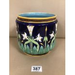 A VICTORIAN MAJOLICA JARDINIERE OF CIRCULAR FORM BY GEORGE JENSEN, DECORATED WITH FLORAL MOTIFS ON A