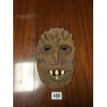 A VERY EARLY WOODEN AFRICAN MASK WITH ORIGINAL TEETH 27 X 17CMS