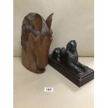 A BUST OF A CARVED WOODEN HORSES HEAD 33 CM WITH A RESIN SPHYNX ON A WOODEN BASE