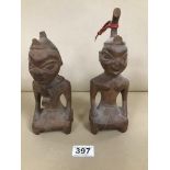 TWO EARLY WOODEN KNEELING AZTEC FIGURES