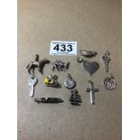 A MIXED LOT OF SILVER CHARMS AND PENDANTS, INCLUDING ONE OF AN OCEAN LINER, CORNISH PASTY AND