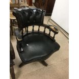 A VINTAGE CAPTAINS ARM CHAIR WITH BUTTON BACK LEATHER UPHOLSTERY TO THE BACK 1970S CANADIAN BY