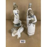 FOUR FIGURES TWO LLADRO AND ONE NAO FIGURE HOLDING A HOOP AND ONE OTHER