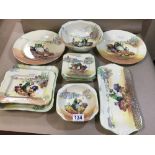 THIRTEEN PIECES OF ROYAL DOULTON 'FLOWER SELLER' SERIES WARE CERAMICS, INCLUDING BOWLS AND PLATES,