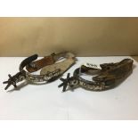 A PAIR OF MEXICAN SILVER INLAY CHIHUAHUA SPURS