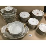 A COLLECTION OF WARWICK PORCELAIN DINNER SERVICE S