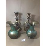 TWO WEIGHTED COPPER CANDLESTICKS WITH TWO BRASS JU