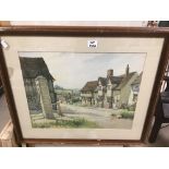 A FRAMED AND GLAZED WATERCOLOUR SIGNED MARC OF A STREET SCENE, 70 X 60CM