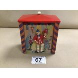 A NOVELTY MUSICAL BOX SHOWING A DANCING CLOWN ALONGSIDE 'HI LILY HI LO' 12CM HIGH