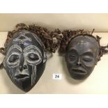 TWO CARVED WOODEN AFRICAN TRIBAL MASKS