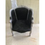 A SILVER AND BLACK LOUIS STYLE CHAIR