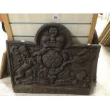 A 1664 CAST IRON FIRE BACK WITH A CREST 64 X 72 CM