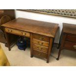 A MAHOGANY BROWN LEATHER TOP VICTORIAN KNEE HOLE DESK