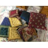 A QUANTITY OF ASSORTED EMBROIDERED CUSHIONS