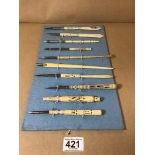 A GROUP OF TEN BONE HANDLED FOUNTAIN PENS/LETTER OPENERS, SOME WITH STANDHOPES TO CENTRE