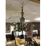 A VINTAGE SOLID BRASS CHANDELIER