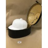 A ROYAL NAVY PITH HELMET IN ORIGINAL METAL CARRYING CASE, ENGRAVED BRASS PLAQUE TO THE FRONT 'J.J