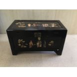 A ORIENTAL CAMPHOR WOOD CHEST WITH ORIENTAL DETAIL A/F