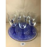 A SET OF SEVEN BRIGHT BLUE WINE GLASS ON MATCHING ART GLASS TRAY
