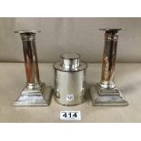 A SILVER PLATE TEA CANISTER (AF) AND A PAIR OF SILVER PLATE CANDLESTICKS