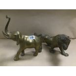 TWO LARGE VINTAGE BRASS ANIMALS ELEPHANT AND TIGER