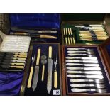 FIVE BOXED SETS OF SILVER PLATED FLATWARE, INCLUDING A HORN HANDLED CARVING SET WITH SILVER COLLARS,