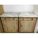 A PAIR OF VICTORIAN PINE CUPBOARDS WITH MARBLE TOPS