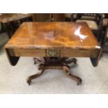 A REGENCY DROP END TABLE WITH INLAID BRASS DETAIL