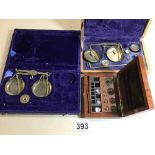 A MAHOGANY CASED SET OF JEWELLERS WEIGHTS AND TWO CASED BEAM SCALES