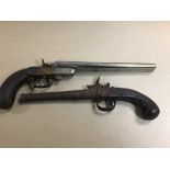 TWO EARLY PISTOLS, ONE BEING A DOUBLE BARRELED MARKED BELGIUM 10.6 105, THE OTHER UNMARKED, BOTH