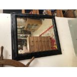 A MODERN WOODEN FRAMED MIRROR 76 X 82CMS