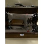 A VINTAGE SINGER SEWING MACHINE 201K IN ORIGINAL CARRY CASE