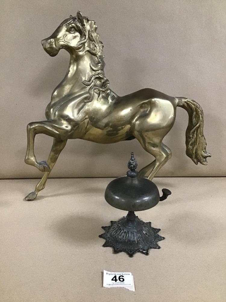 AN ORNATE VICTORIAN BRASS DESK BELL, 15CM HIGH, TOGETHER WITH A LARGE BRASS FIGURE OF A HORSE