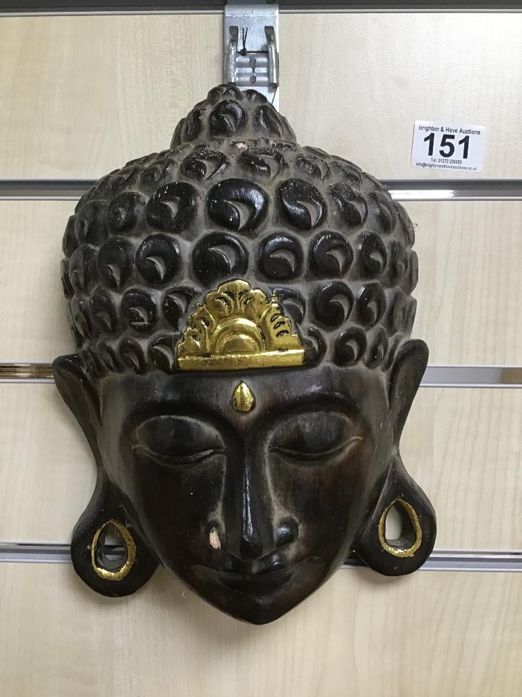 A CARVED WOODEN WALL PLAQUE DEPICTING BUDDHA, DECORATED WITH GILT DETAILING